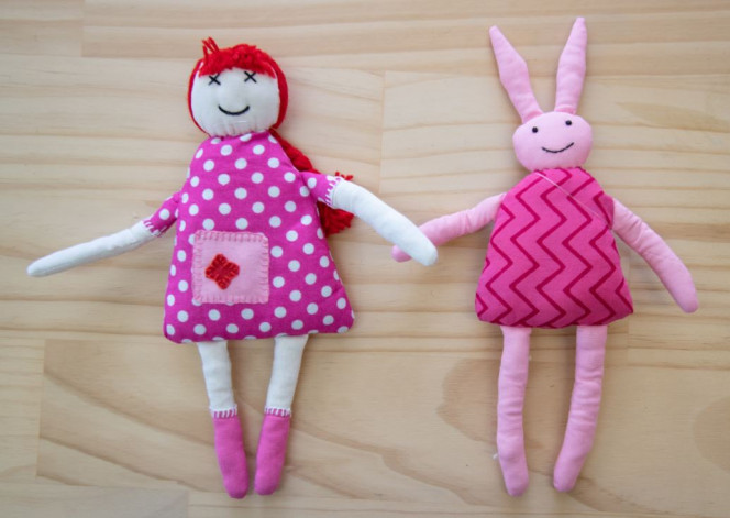 Trade Aid pink doll and rabbit toys with kapok filling
